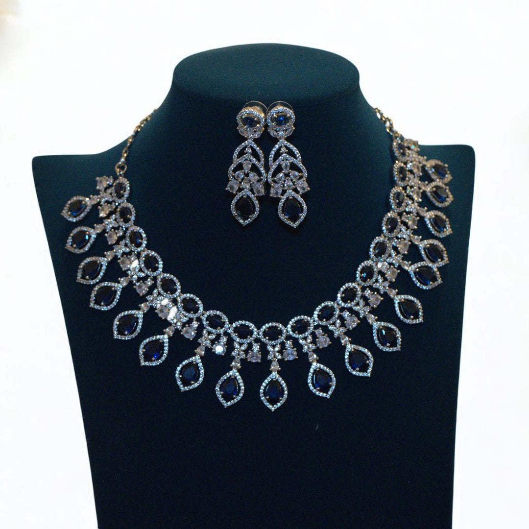 Elegant Rhodium-Plated Necklace with Clustered AD, CZ & Blue Stones