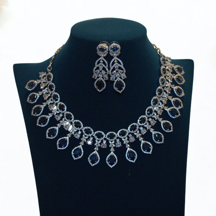 Elegant Rhodium-Plated Necklace with Clustered AD, CZ & Blue Stones
