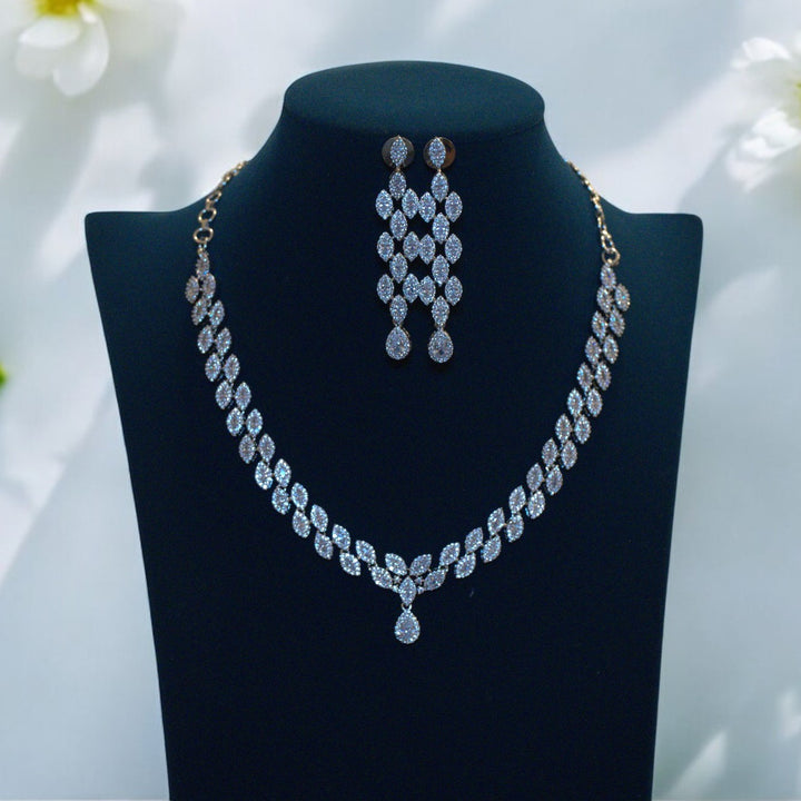 Elegant Rhodium-Plated Necklace with Clustered AD, Micro CZ & Drop Pendant