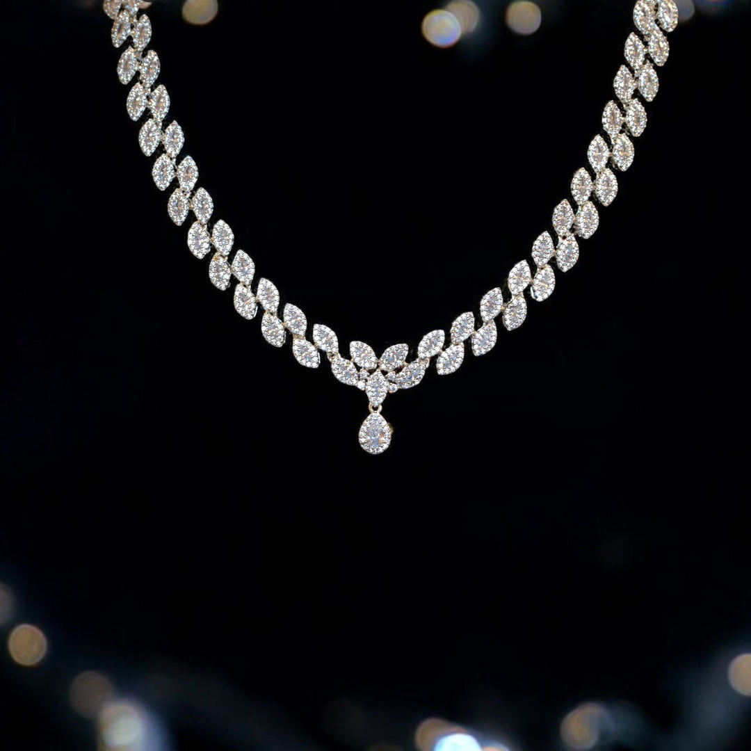 Elegant Rhodium-Plated Necklace with Clustered AD, Micro CZ & Drop Pendant