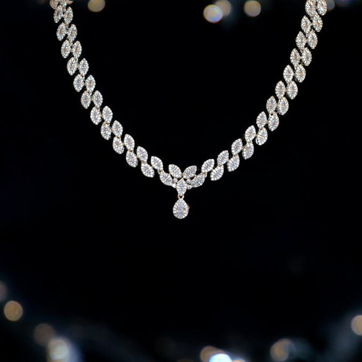 Elegant Rhodium-Plated Necklace with Clustered AD, Micro CZ & Drop Pendant